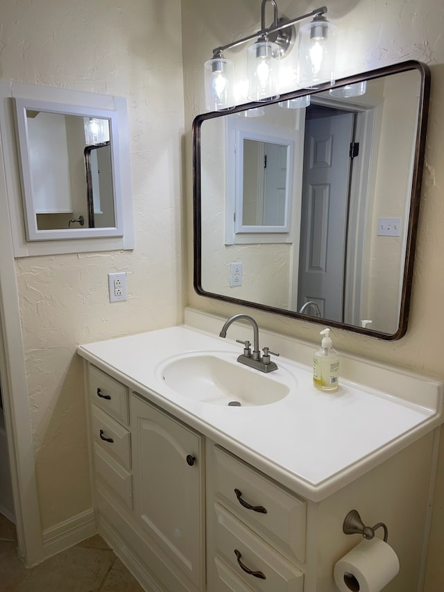 14515 Wunderlich Dr Unit 1703, Houston, TX 77069 - bathroom featuring vanity, tile patterned flooring, and a textured wall