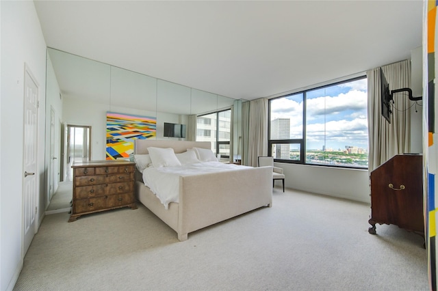 14 Greenway Plz Unit 19P, Houston, TX 77046 - bedroom featuring carpet floors