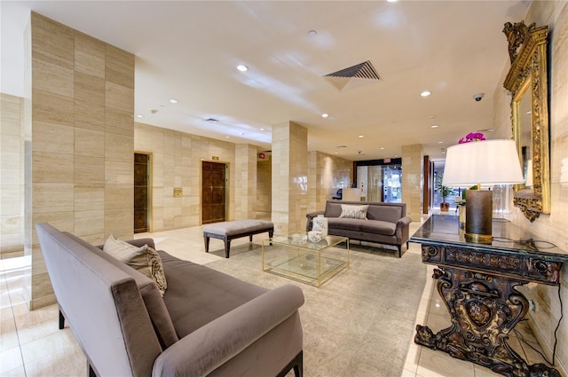14 Greenway Plz Unit 19P, Houston, TX 77046 - building lobby with tile walls and recessed lighting
