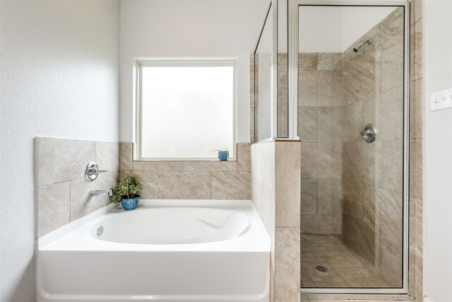 619 Palo Alto Ct, Rosharon, TX 77583 - full bathroom with a shower stall and a garden tub