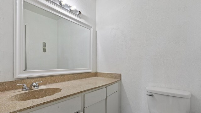 212 Plaza Verde Dr Unit F-22, Houston, TX 77038 - bathroom featuring vanity and toilet