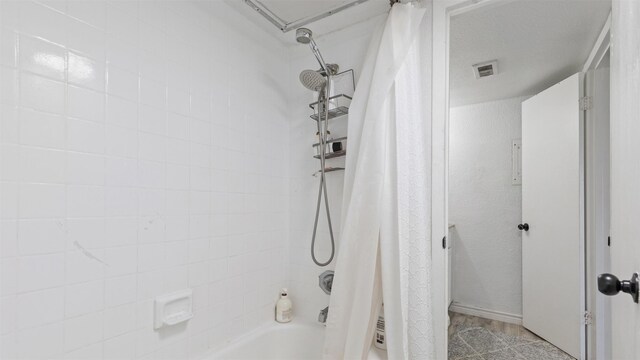 212 Plaza Verde Dr Unit F-22, Houston, TX 77038 - full bath featuring shower / bath combo with shower curtain