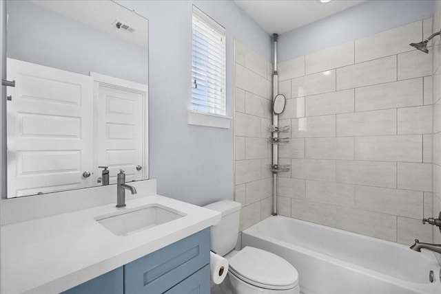 2607 Mcilhenny St, Houston, TX 77004 - bathroom with toilet, vanity, and shower / washtub combination
