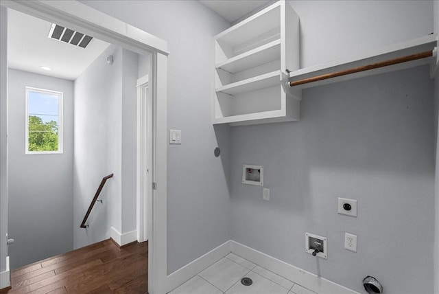 2607 Mcilhenny St, Houston, TX 77004 - washroom with washer hookup, hookup for an electric dryer, and baseboards