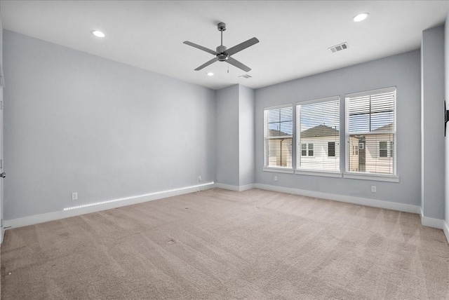 2607 Mcilhenny St, Houston, TX 77004 - spare room with ceiling fan, baseboards, light carpet, and recessed lighting