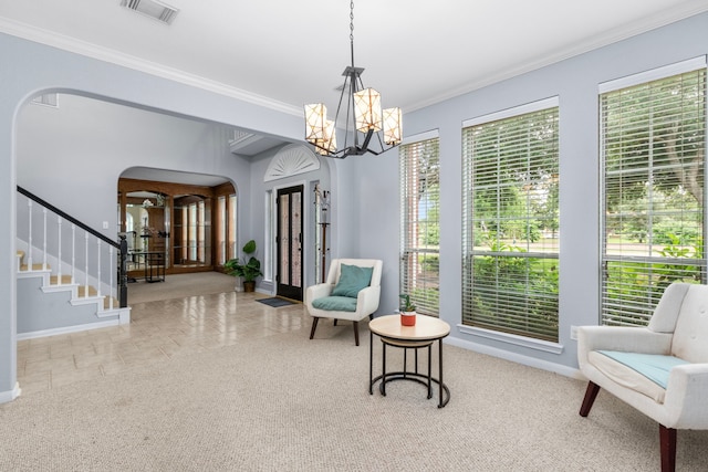 3815 Griffin Ln, Missouri City, TX 77459 - sitting room featuring ornamental molding, a chandelier, arched walkways, stairs, and baseboards