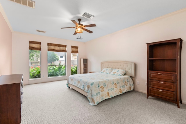 3815 Griffin Ln, Missouri City, TX 77459 - bedroom with carpet floors, crown molding, and a ceiling fan