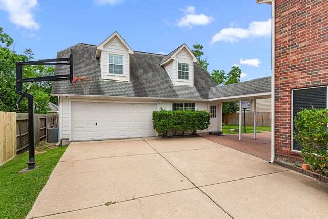 3815 Griffin Ln, Missouri City, TX 77459 - view of front of property with a shingled roof, concrete driveway, and an attached garage