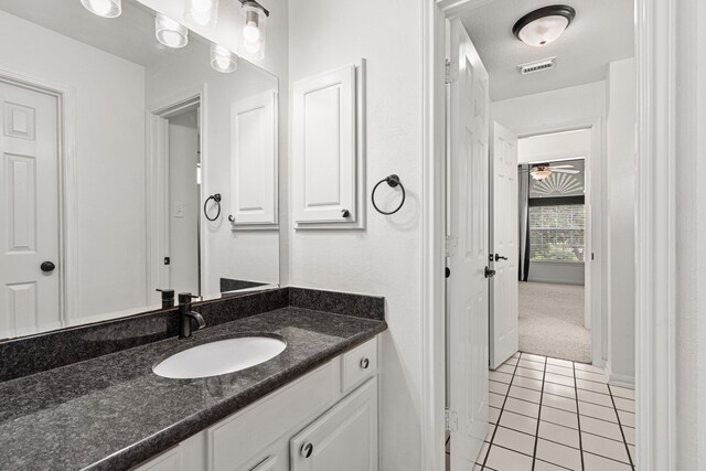 3815 Griffin Ln, Missouri City, TX 77459 - bathroom featuring tile patterned flooring and vanity