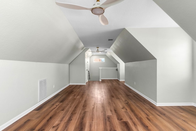 3815 Griffin Ln, Missouri City, TX 77459 - bonus room with a ceiling fan, wood finished floors, vaulted ceiling, and baseboards
