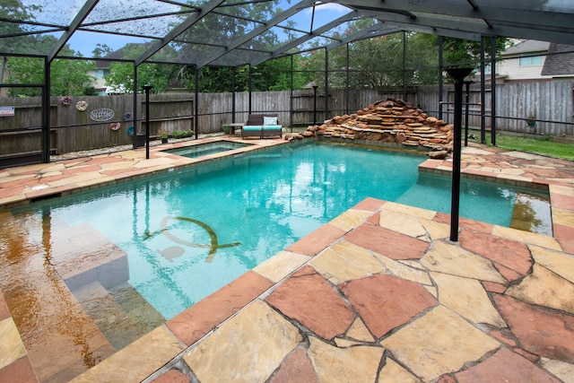 3815 Griffin Ln, Missouri City, TX 77459 - view of pool with a fenced backyard, a lanai, a patio area, and a pool with connected hot tub