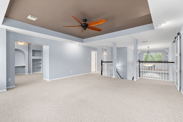 3815 Griffin Ln, Missouri City, TX 77459 - carpeted spare room featuring a ceiling fan, baseboards, and a tray ceiling