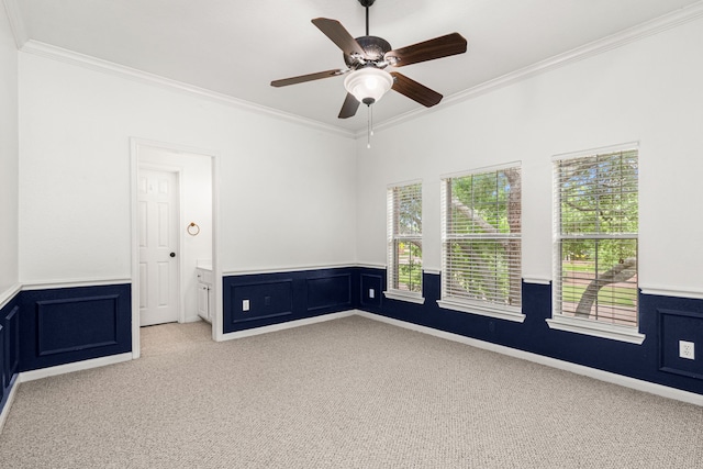 3815 Griffin Ln, Missouri City, TX 77459 - unfurnished room with carpet, ornamental molding, wainscoting, and a ceiling fan