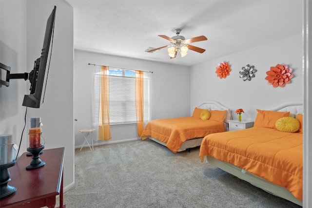 1012 Walnut Pointe, League City, TX 77573 - bedroom featuring carpet flooring, baseboards, and ceiling fan