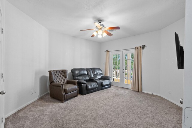 1012 Walnut Pointe, League City, TX 77573 - carpeted living area featuring french doors, a ceiling fan, and baseboards