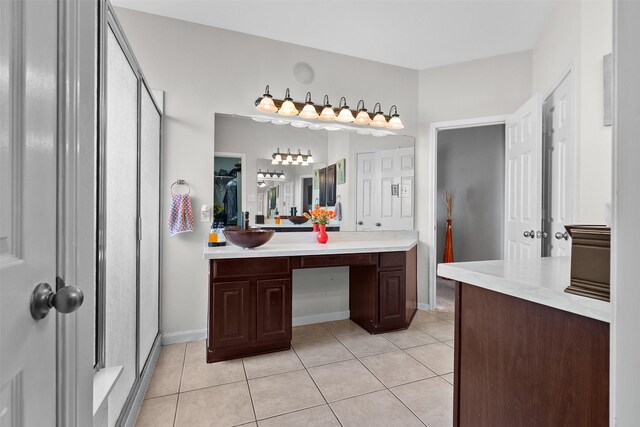 1012 Walnut Pointe, League City, TX 77573 - bathroom featuring tile patterned floors, vanity, and baseboards