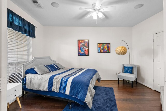 1012 Walnut Pointe, League City, TX 77573 - bedroom featuring wood finished floors, ceiling fan, and baseboards