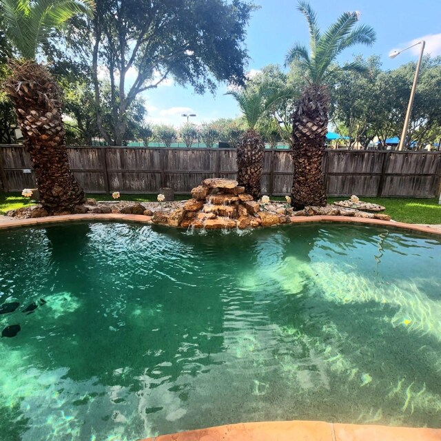 1012 Walnut Pointe, League City, TX 77573 - view of swimming pool with a fenced backyard