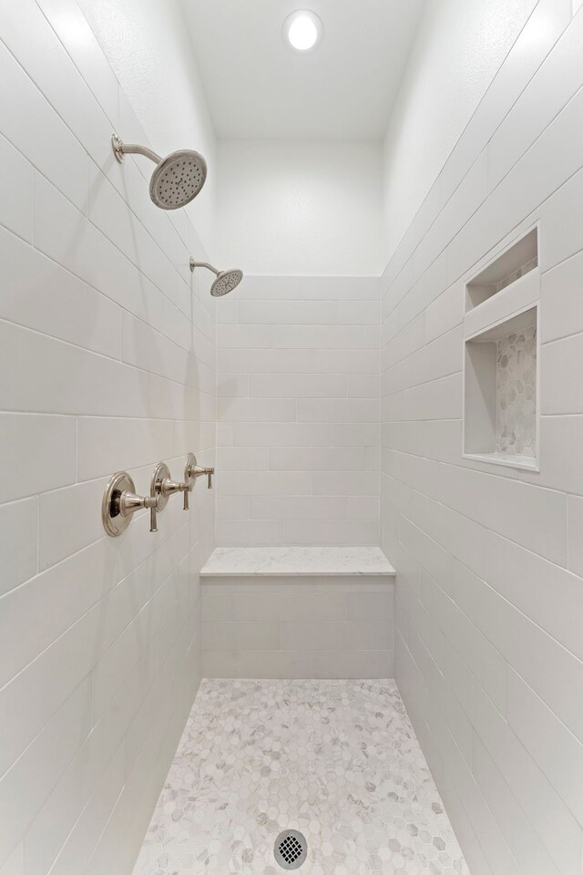 567 Lonestar Rd, Huntsville, TX 77340 - full bathroom with a tile shower and recessed lighting