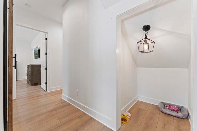 567 Lonestar Rd, Huntsville, TX 77340 - hallway featuring light wood-style flooring and baseboards