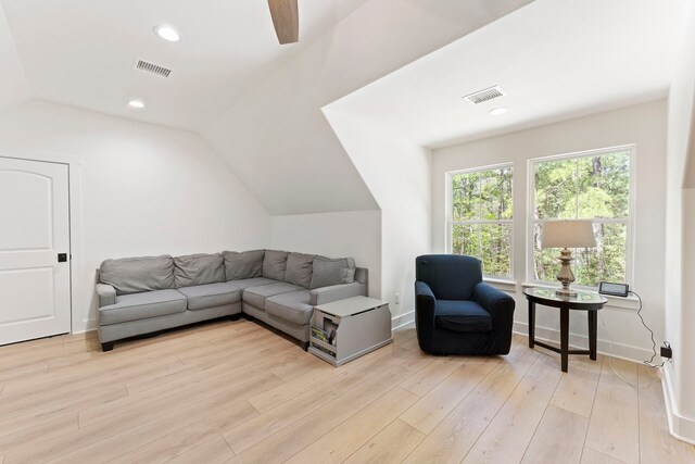 567 Lonestar Rd, Huntsville, TX 77340 - living room with lofted ceiling, light wood-style flooring, baseboards, a ceiling fan, and recessed lighting