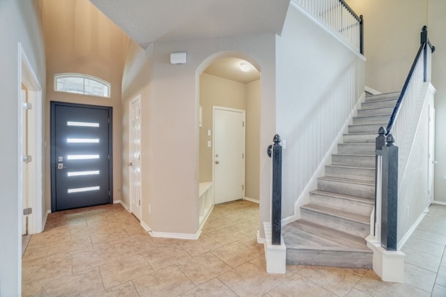 6763 Indian Ldg, San Antonio, TX 78253 - entryway with arched walkways, light tile patterned floors, and stairway
