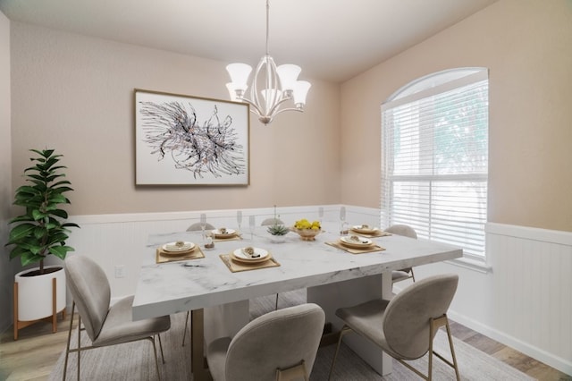 6763 Indian Ldg, San Antonio, TX 78253 - dining area featuring wainscoting, light wood-style floors, and a chandelier