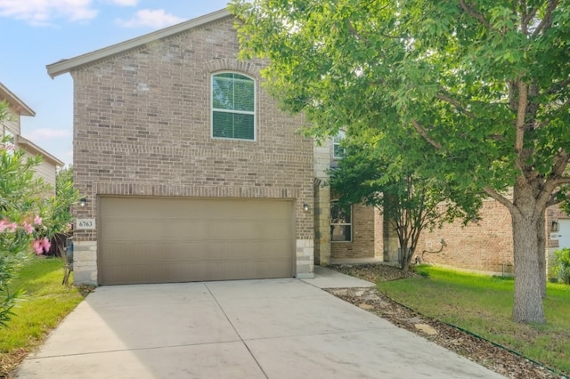 6763 Indian Ldg, San Antonio, TX 78253 - view of front of property featuring brick siding, a garage, driveway, and a front yard