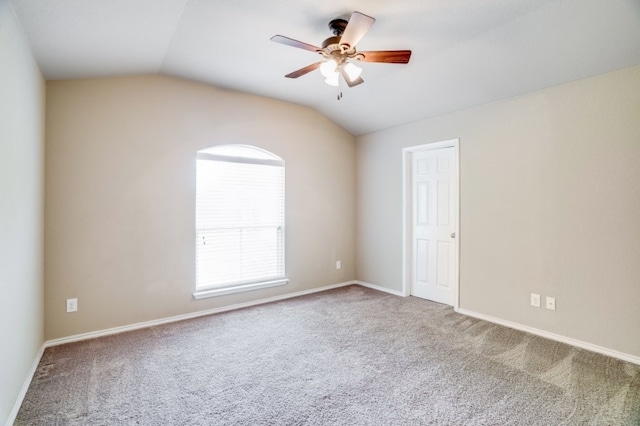 6763 Indian Ldg, San Antonio, TX 78253 - empty room featuring a ceiling fan, lofted ceiling, carpet flooring, and baseboards