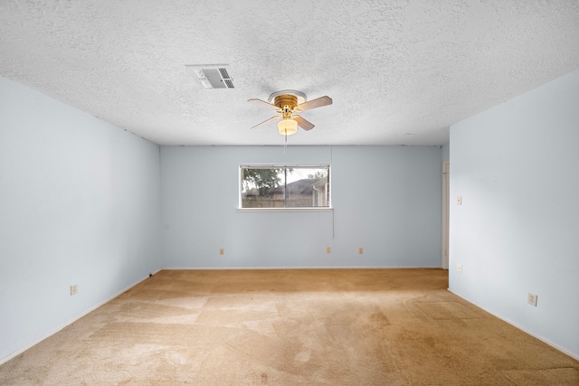1639 Castle Creek Dr, Missouri City, TX 77489 - unfurnished room featuring carpet flooring, a ceiling fan, and a textured ceiling