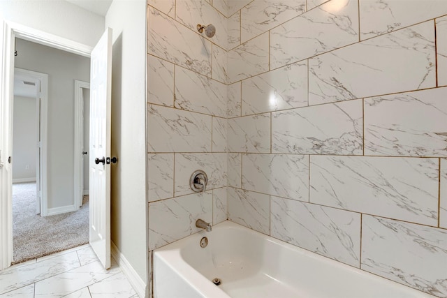 9022 Sultan Dr, Houston, TX 77078 - bathroom with baseboards, marble finish flooring, and  shower combination