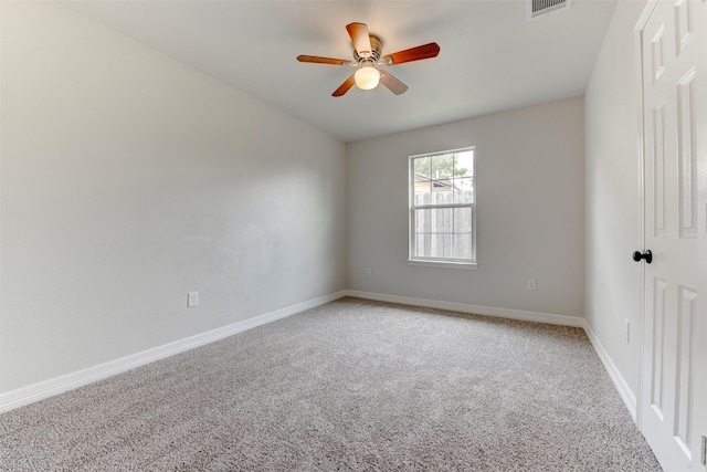 9022 Sultan Dr, Houston, TX 77078 - spare room featuring light colored carpet, a ceiling fan, and baseboards