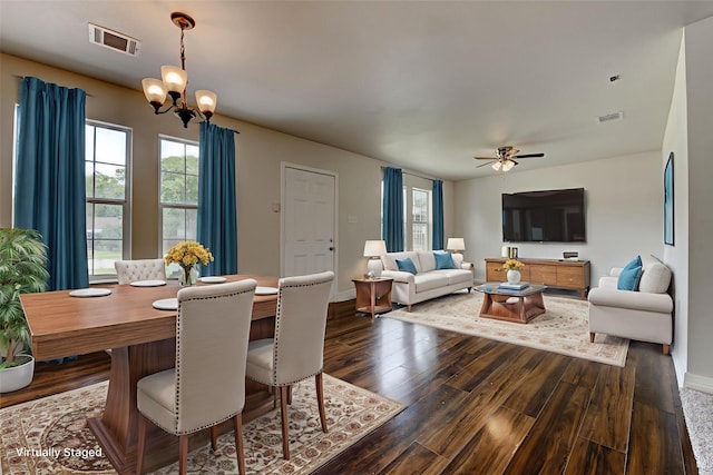 9022 Sultan Dr, Houston, TX 77078 - dining room featuring a chandelier, dark wood-style floors, baseboards, and a ceiling fan
