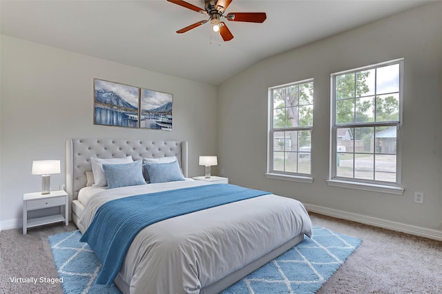 9022 Sultan Dr, Houston, TX 77078 - bedroom with carpet floors, baseboards, vaulted ceiling, and a ceiling fan