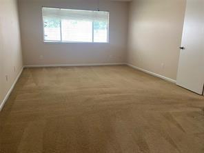 2214 S Ferrisburg Ct, Sugar Land, TX 77478 - empty room with baseboards