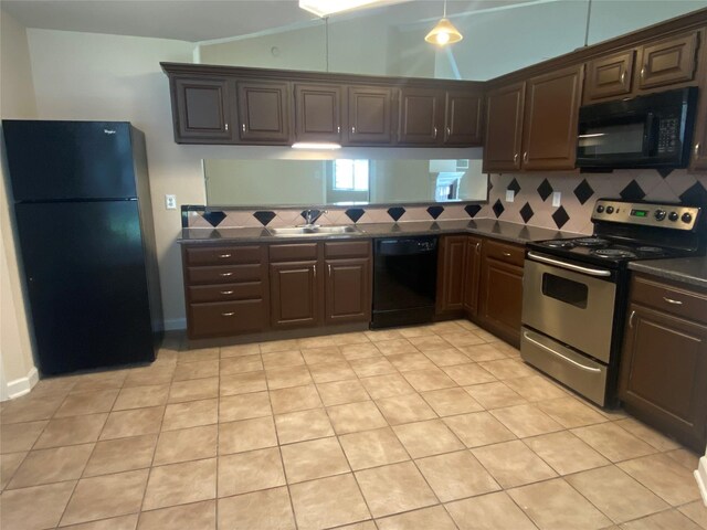 2214 S Ferrisburg Ct, Sugar Land, TX 77478 - kitchen featuring black appliances, dark countertops, backsplash, and a sink