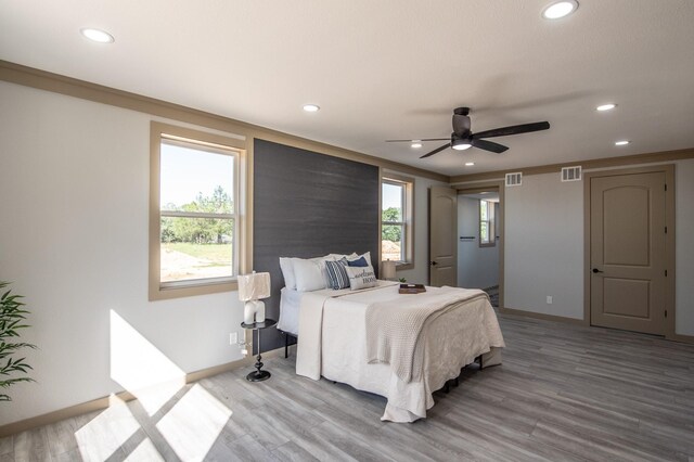 103 Whispering Oaks, Somerville, TX 77879 - bedroom with recessed lighting, wood finished floors, baseboards, and ceiling fan