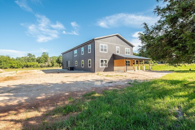 103 Whispering Oaks, Somerville, TX 77879 - view of property exterior with central AC unit