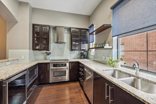 2110 Shearn St Unit 5, Houston, TX 77007 - kitchen with stainless steel appliances, wall chimney exhaust hood, beverage cooler, a sink, and dark brown cabinets