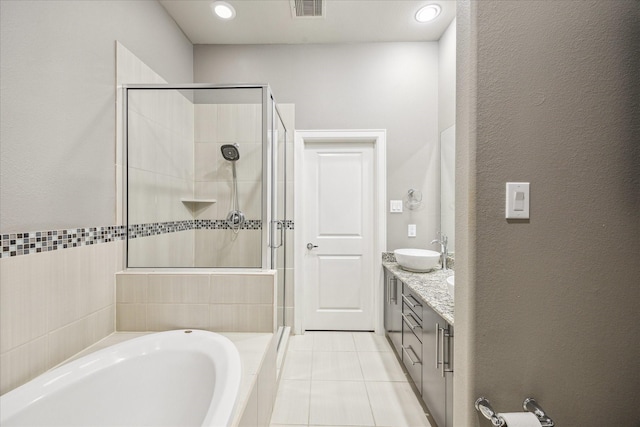 2110 Shearn St Unit 5, Houston, TX 77007 - full bath featuring a stall shower, a bath, double vanity, and tile patterned flooring