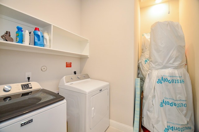 18234 Shoreline Vista Ln, Cypress, TX 77433 - laundry room with washer and dryer and baseboards
