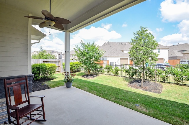 18234 Shoreline Vista Ln, Cypress, TX 77433 - view of patio featuring ceiling fan and a residential view