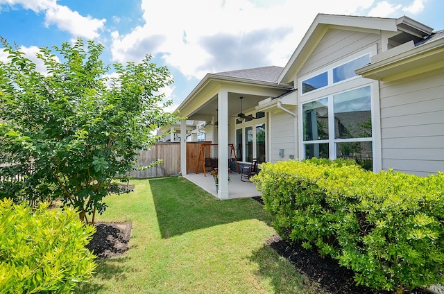 18234 Shoreline Vista Ln, Cypress, TX 77433 - view of yard with a ceiling fan and a patio