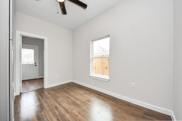 409 S 72nd St, Houston, TX 77011 - unfurnished room with ceiling fan, dark wood-type flooring, and baseboards