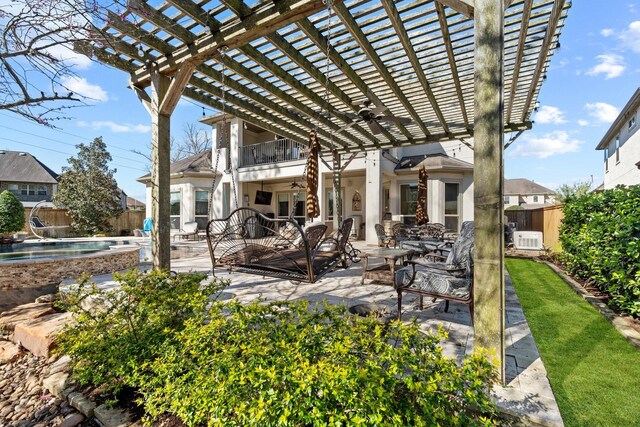 5131 Rowley Falls Ln, Sugar Land, TX 77479 - fenced backyard with ceiling fan, a pergola, an outdoor living space, and a balcony