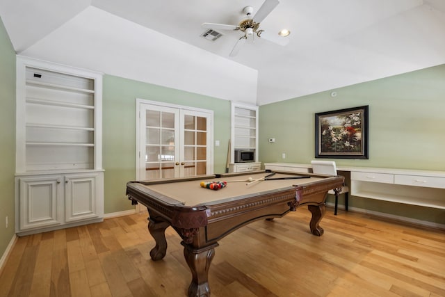 12126 Oak Park Dr, Houston, TX 77070 - playroom with light wood-type flooring, ceiling fan, vaulted ceiling, built in features, and french doors