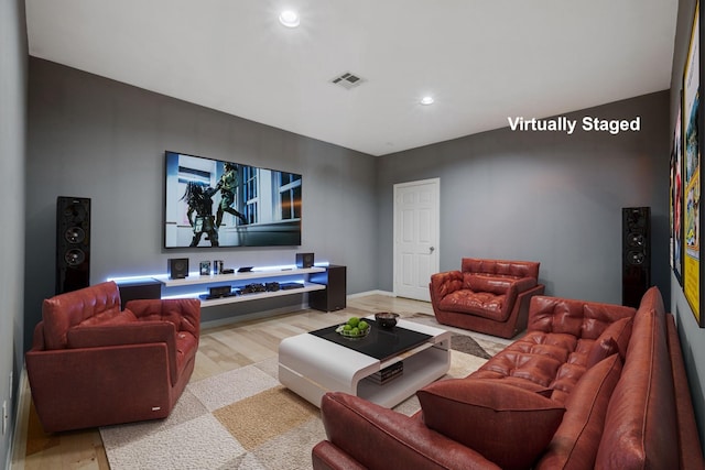 12126 Oak Park Dr, Houston, TX 77070 - living area with wood finished floors, recessed lighting, and baseboards