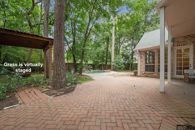 12126 Oak Park Dr, Houston, TX 77070 - fenced backyard featuring a patio area and an outdoor pool