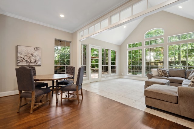 12126 Oak Park Dr, Houston, TX 77070 - dining area with wood finished floors, recessed lighting, baseboards, and high vaulted ceiling