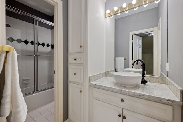 12126 Oak Park Dr, Houston, TX 77070 - bathroom with vanity, shower / bath combination with glass door, and tile patterned floors